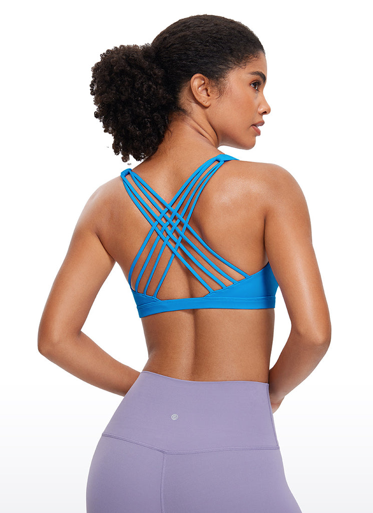 CRZ YOGA Women's Yoga Light Support Nakedfeel Strappy Bra Low Cut Madagascar Blue