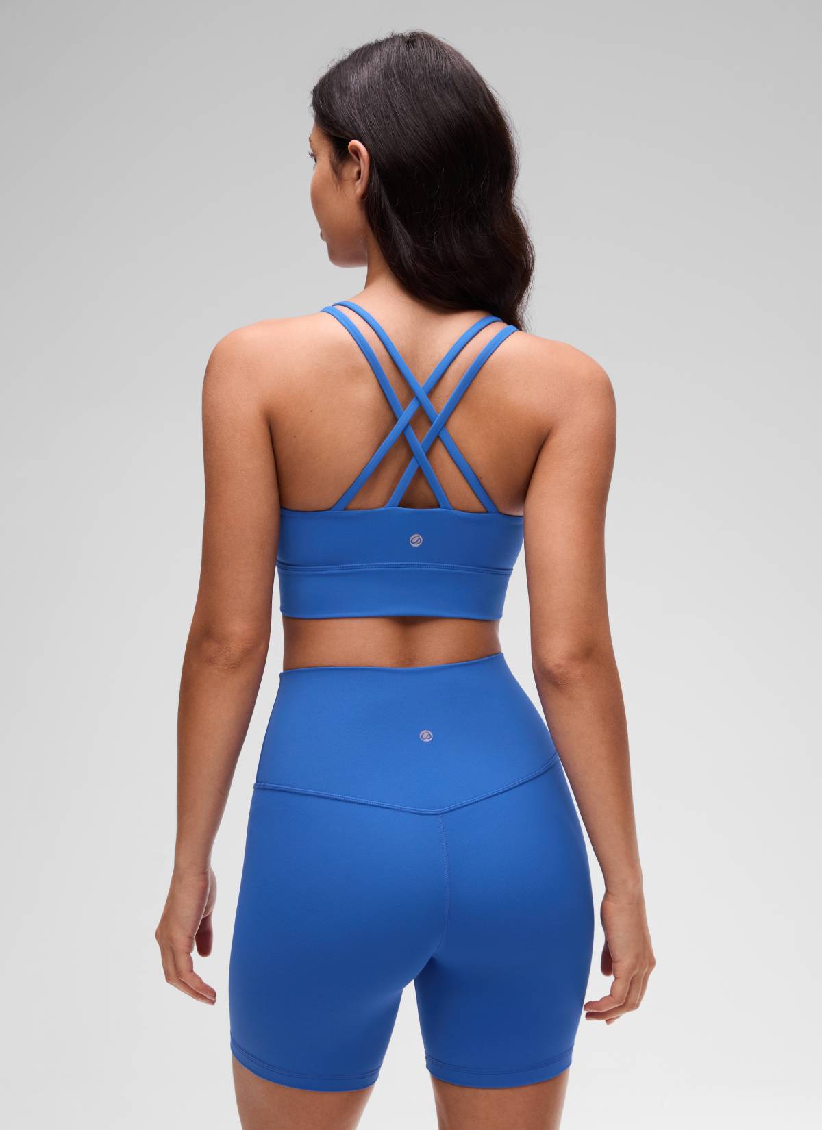 CRZ YOGA Womens Butterluxe Strappy Longline Criss Cross Molded Cup Bra Sparkle Blue @model_info:Maysa