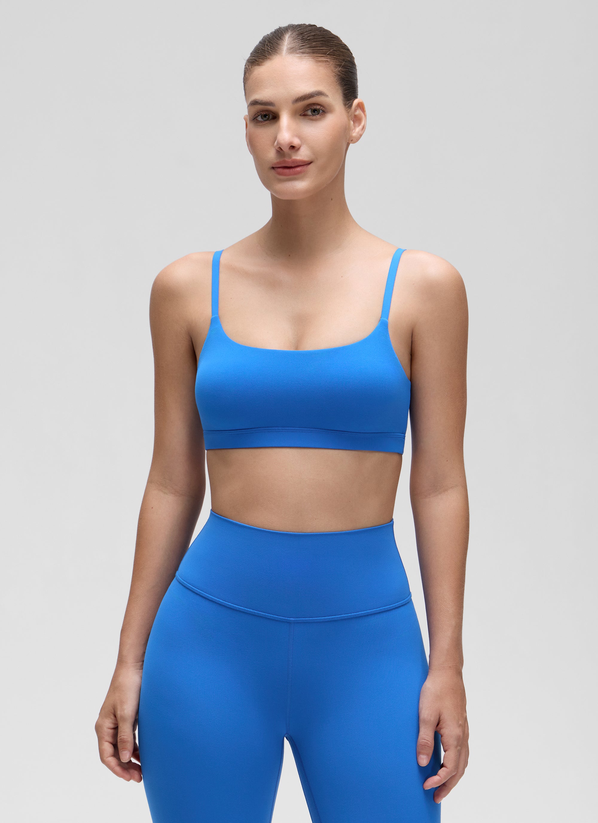 CRZ YOGA Womens Butterluxe Adjustable Spaghetti Strap Scoop Neck Bra Sparkle Blue @model_info:Jaynne