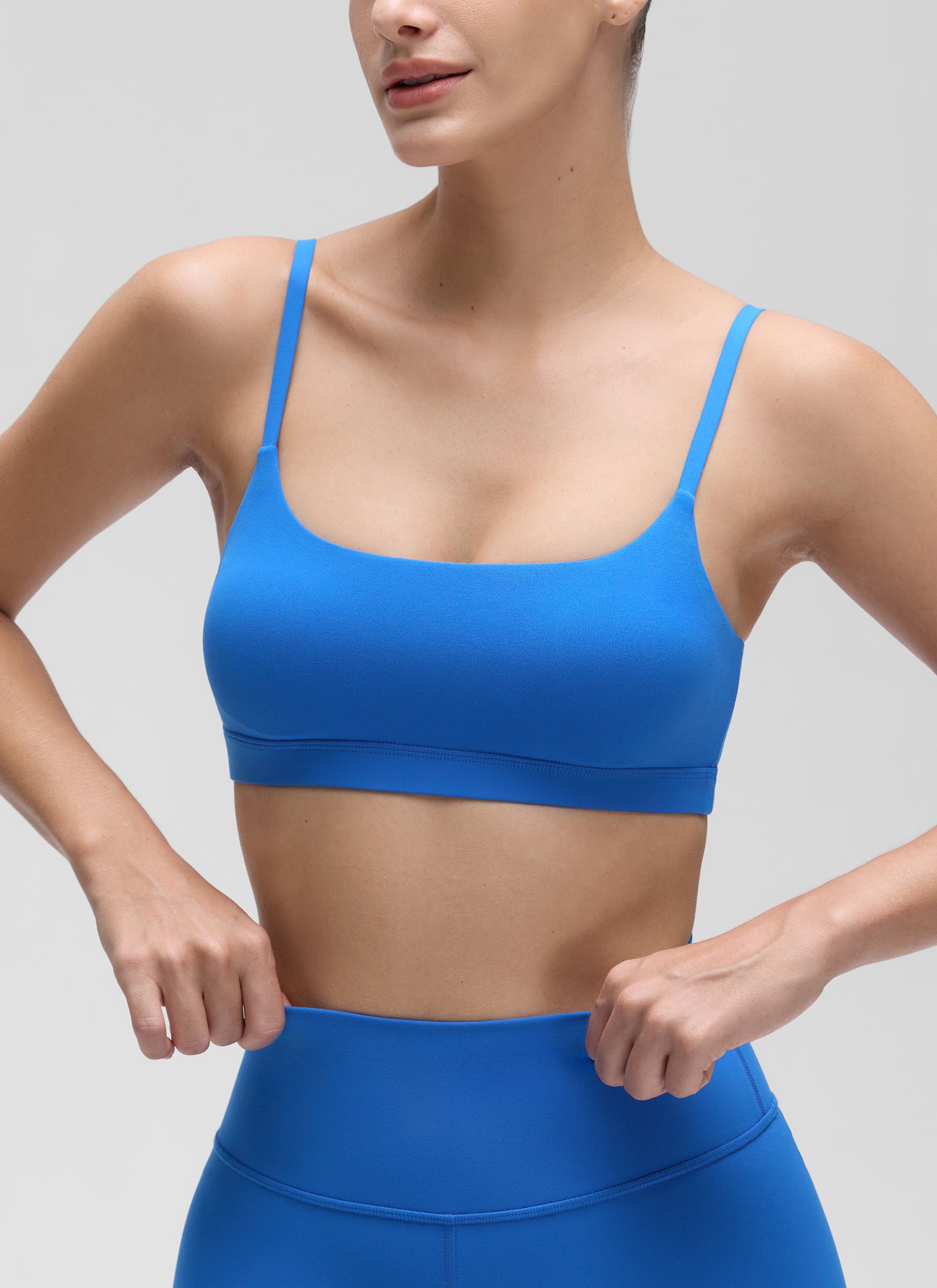 CRZ YOGA Womens Butterluxe Adjustable Spaghetti Strap Scoop Neck Bra Sparkle Blue @model_info:Jaynne
