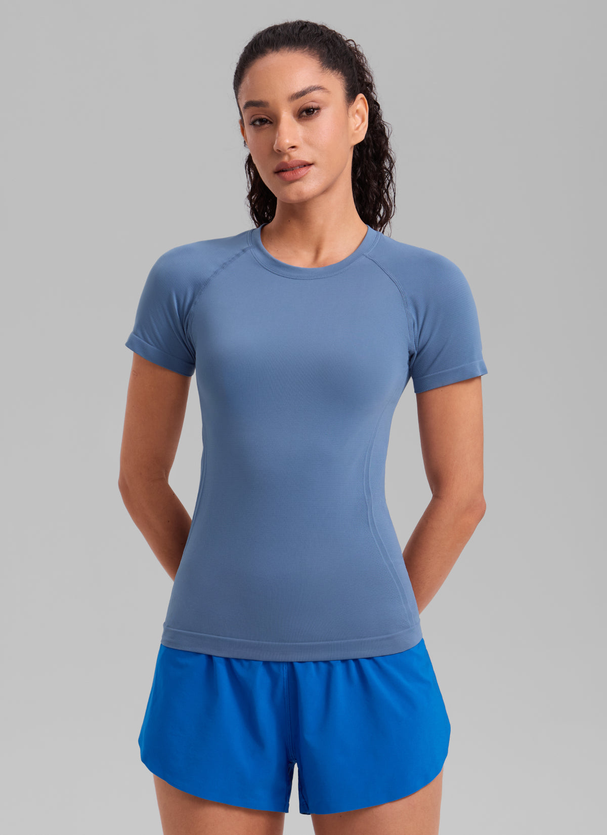 CRZ YOGA Women's Running Classic Fit Shirts Seamless Short Sleeves Oasis Blue @model_info:Larissa