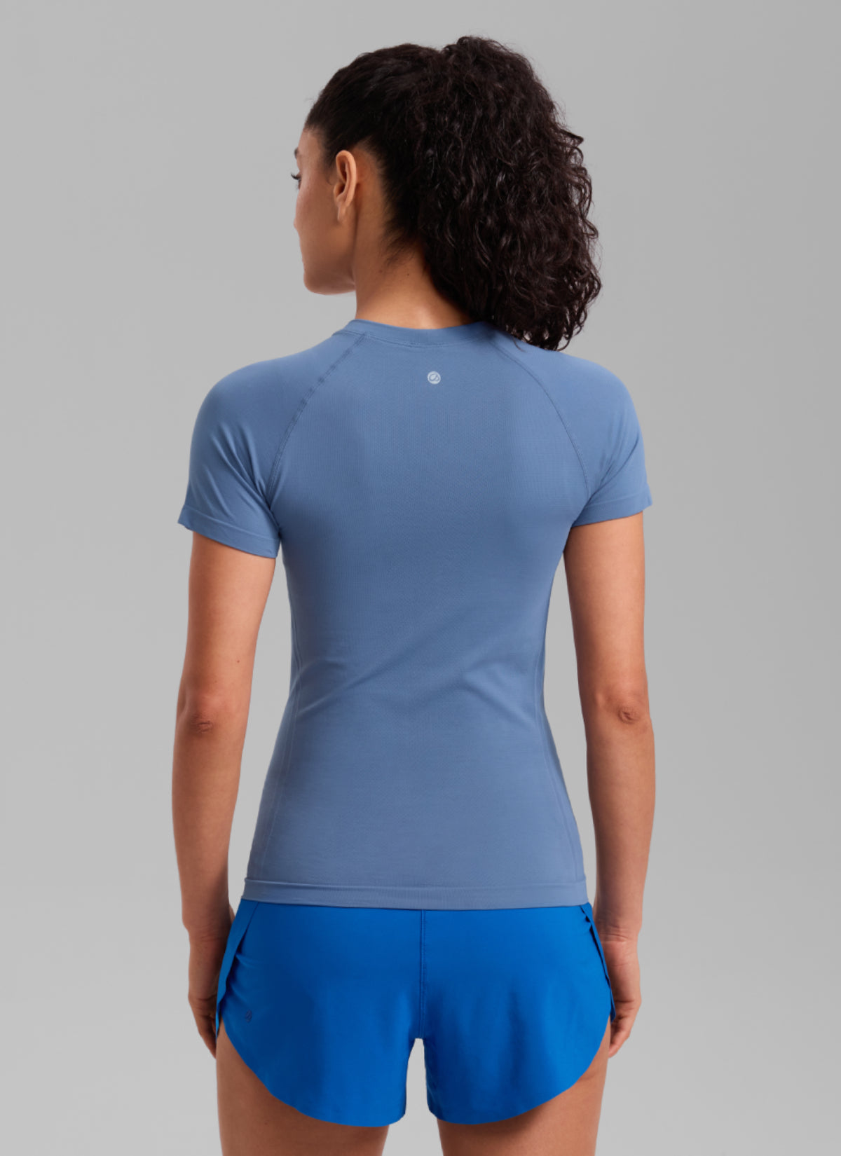 CRZ YOGA Women's Running Classic Fit Shirts Seamless Short Sleeves Oasis Blue @model_info:Larissa
