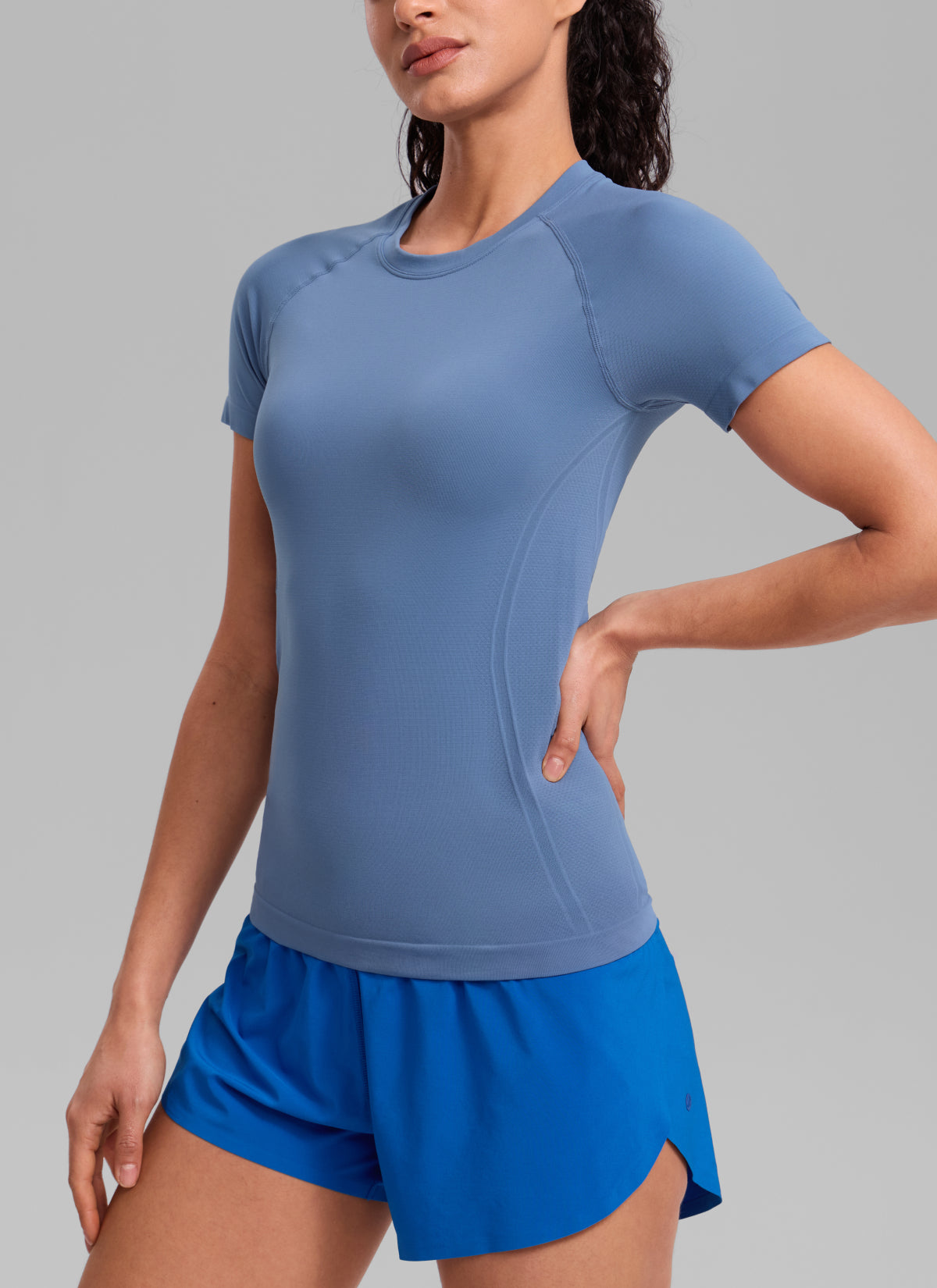CRZ YOGA Women's Running Classic Fit Shirts Seamless Short Sleeves Oasis Blue @model_info:Larissa