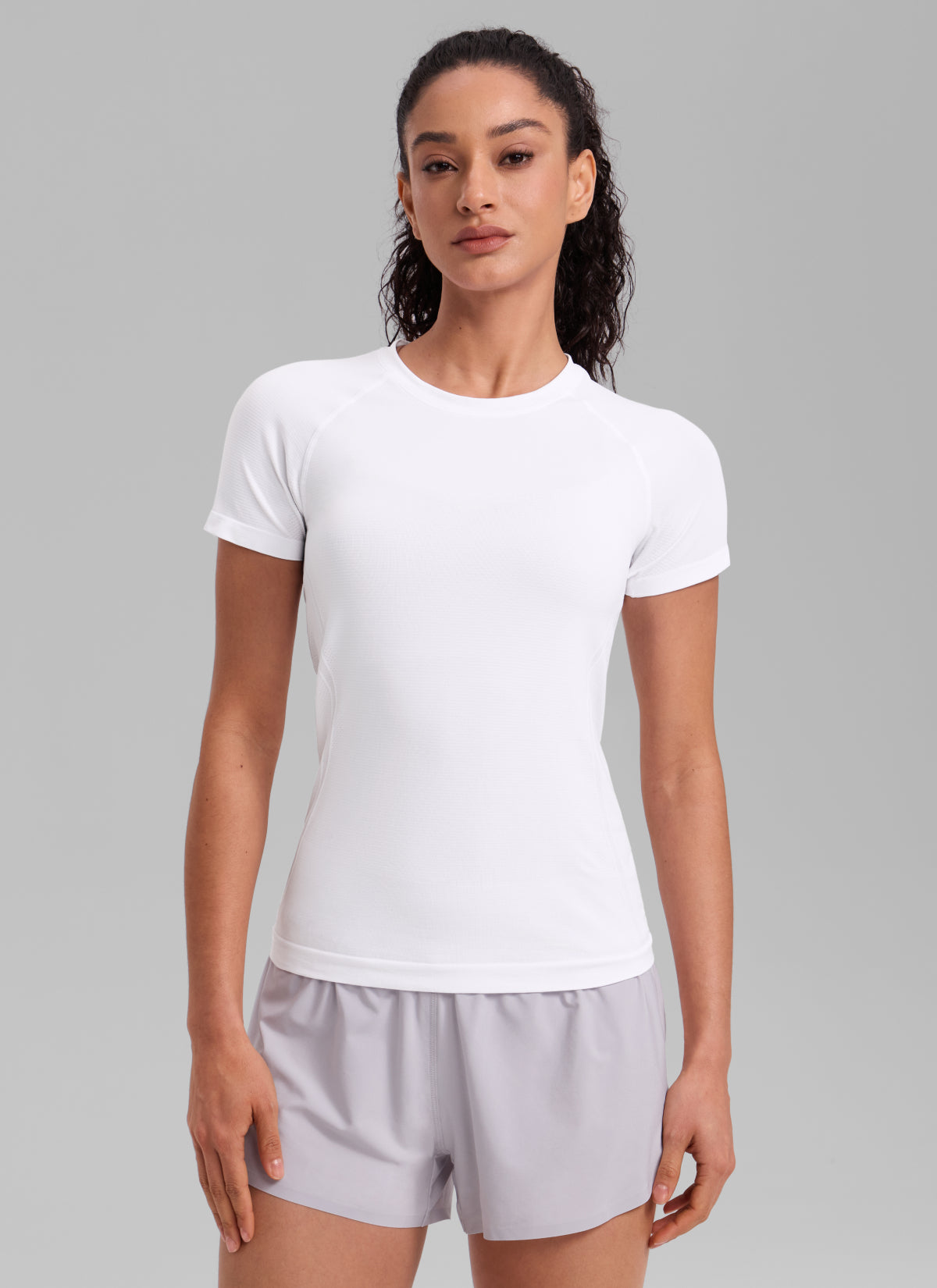 CRZ YOGA Women's Running Classic Fit Shirts Seamless Short Sleeves White @model_info:Larissa