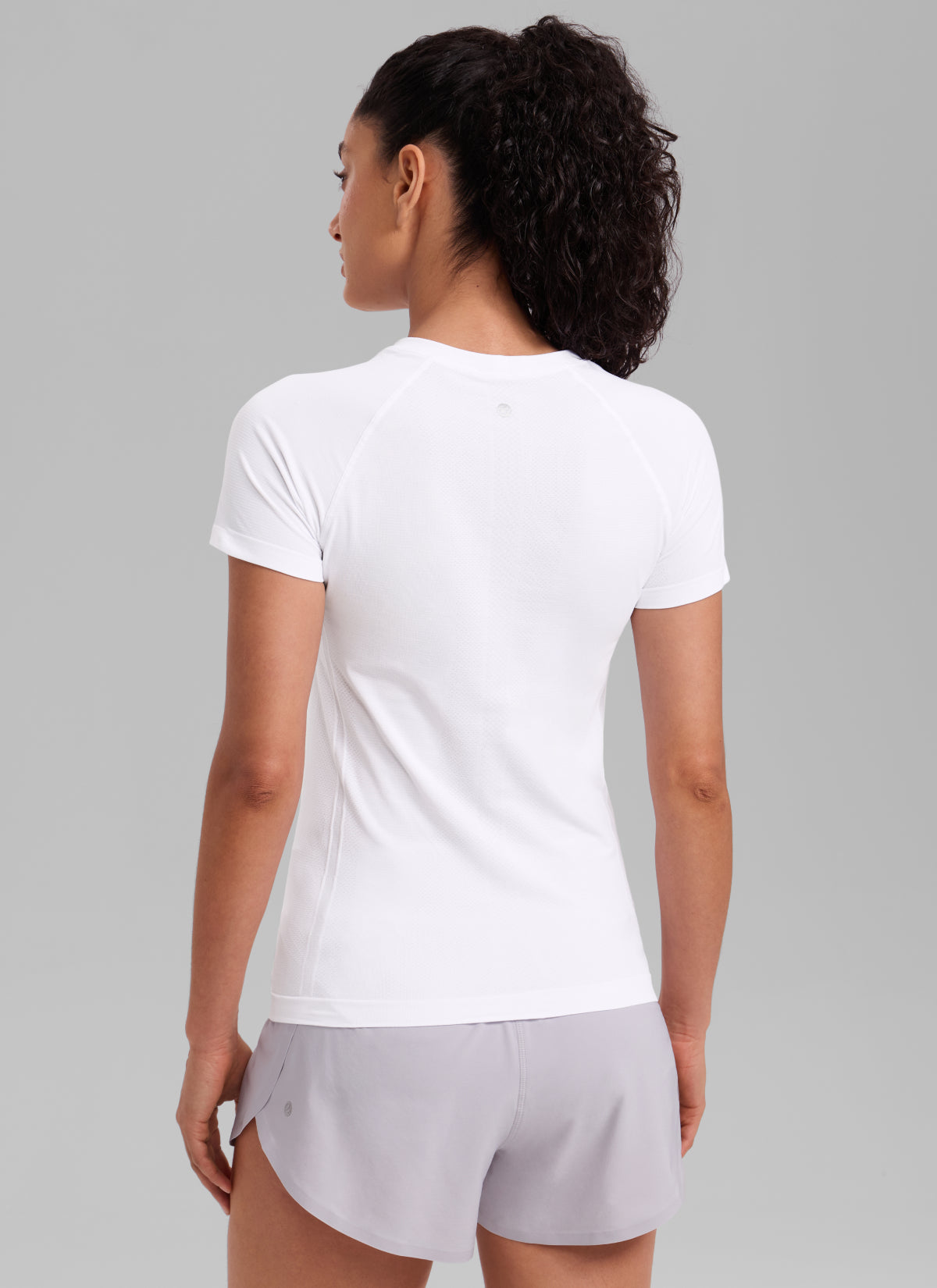 CRZ YOGA Women's Running Classic Fit Shirts Seamless Short Sleeves White @model_info:Larissa