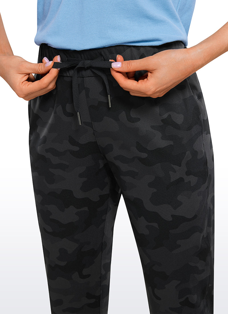 CRZ YOGA Women's Travel Slim Fit Stretch Drawstring Jogger 27'' Dark grey camouflage