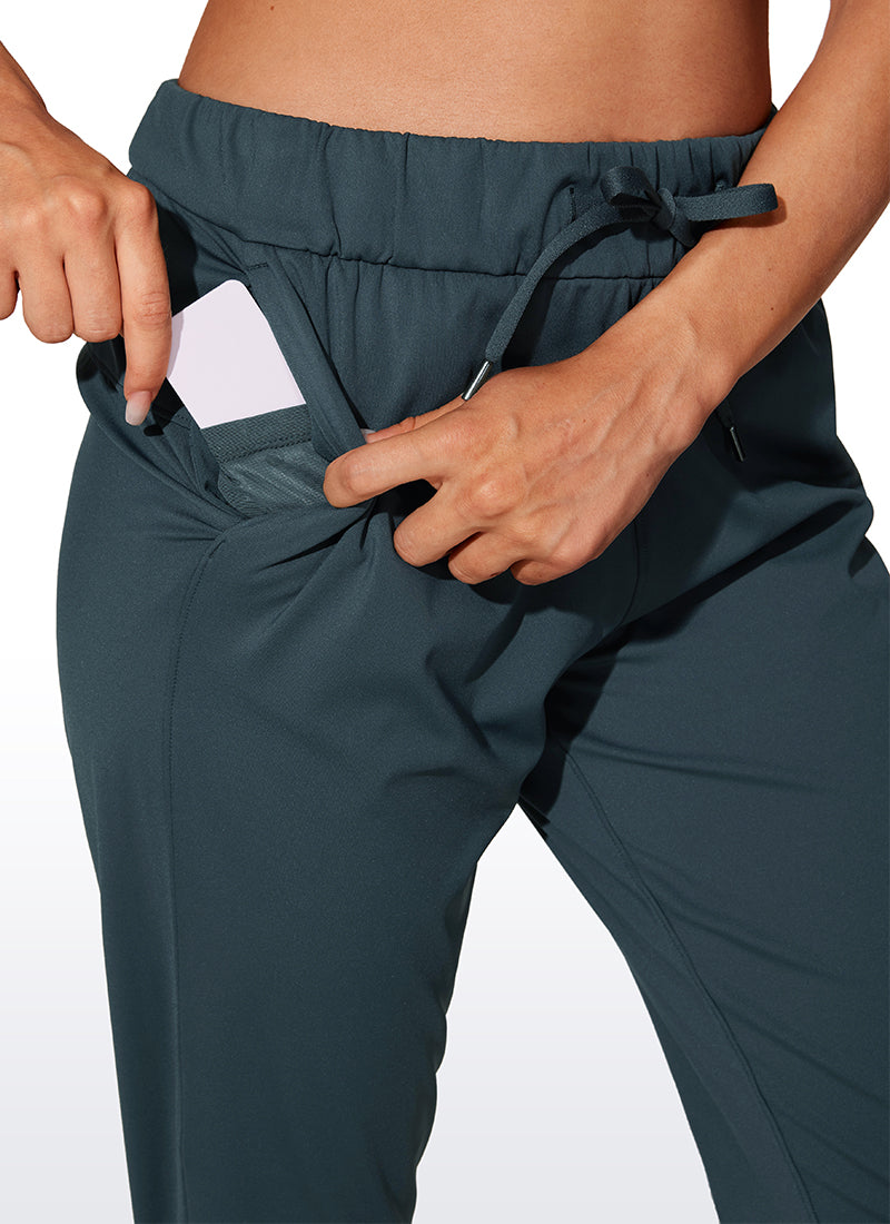 CRZ YOGA Women's Travel Slim Fit Stretch Drawstring Jogger 27'' Olive Green