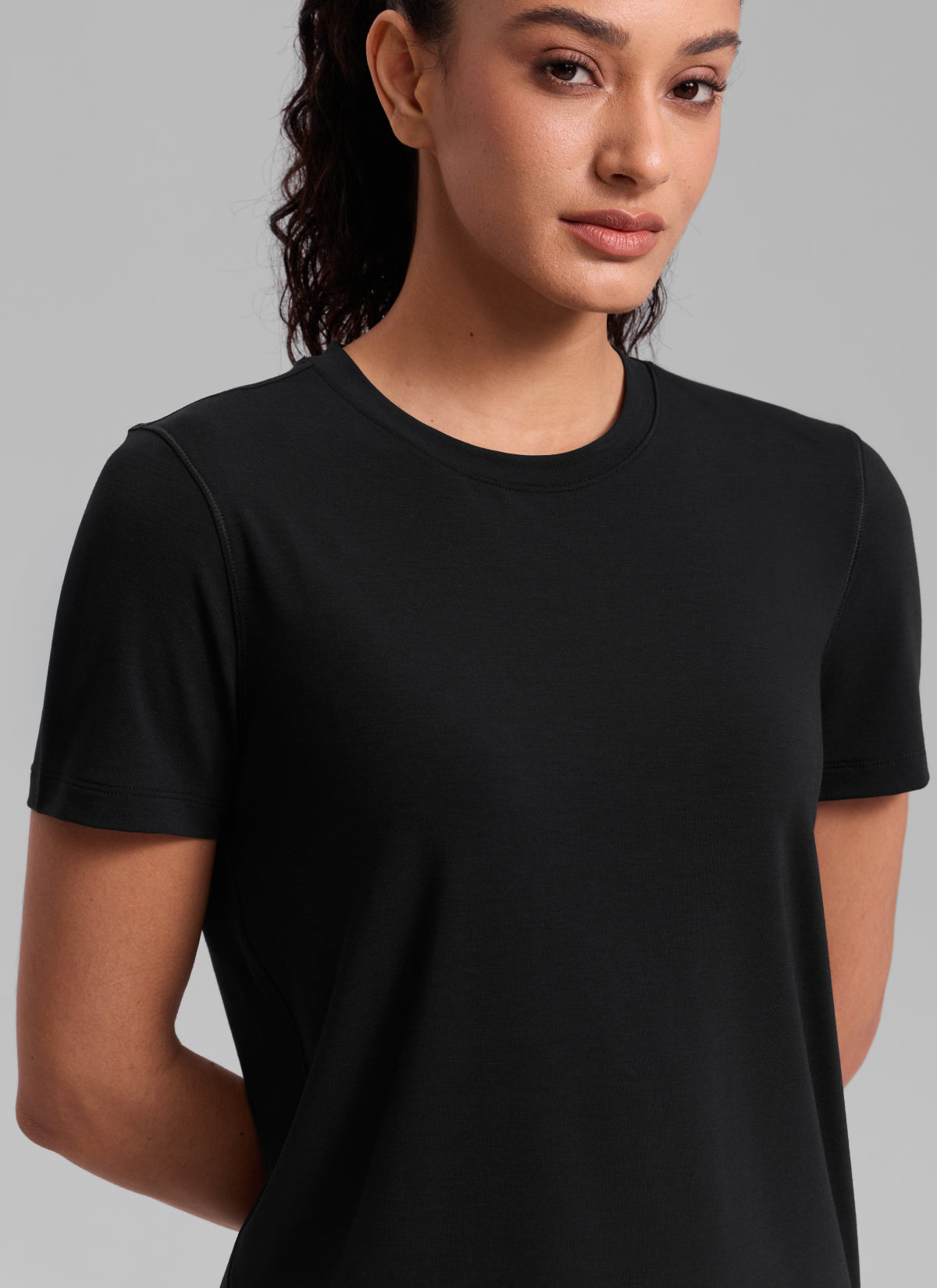 CRZ YOGA Women's Quick Dry Workout Crewneck Hip Length Short Sleeve Black