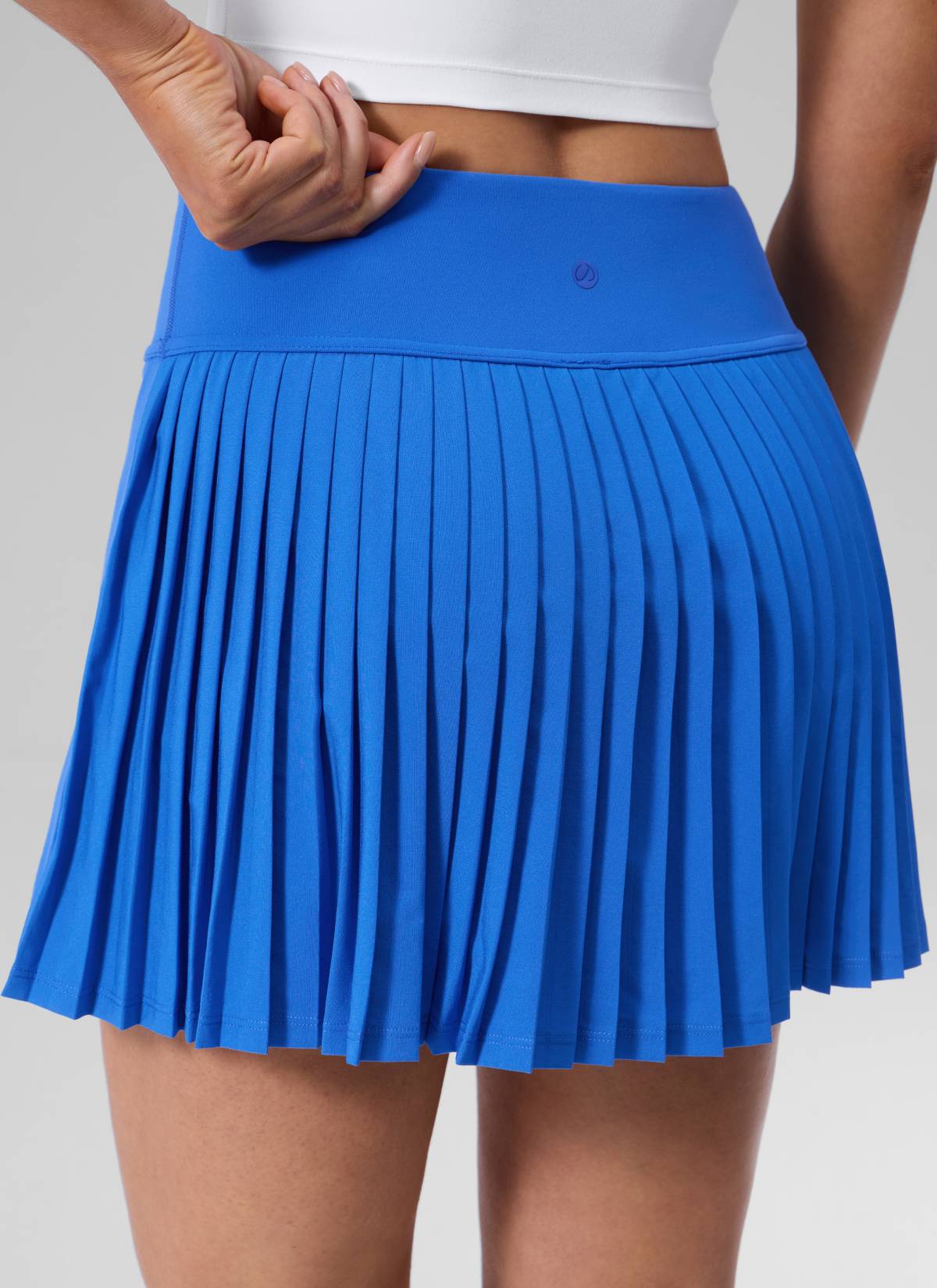 CRZ YOGA Women's Dual-fabric Tennis Pocket Pleated Back Mini Skirt Sparkle Blue