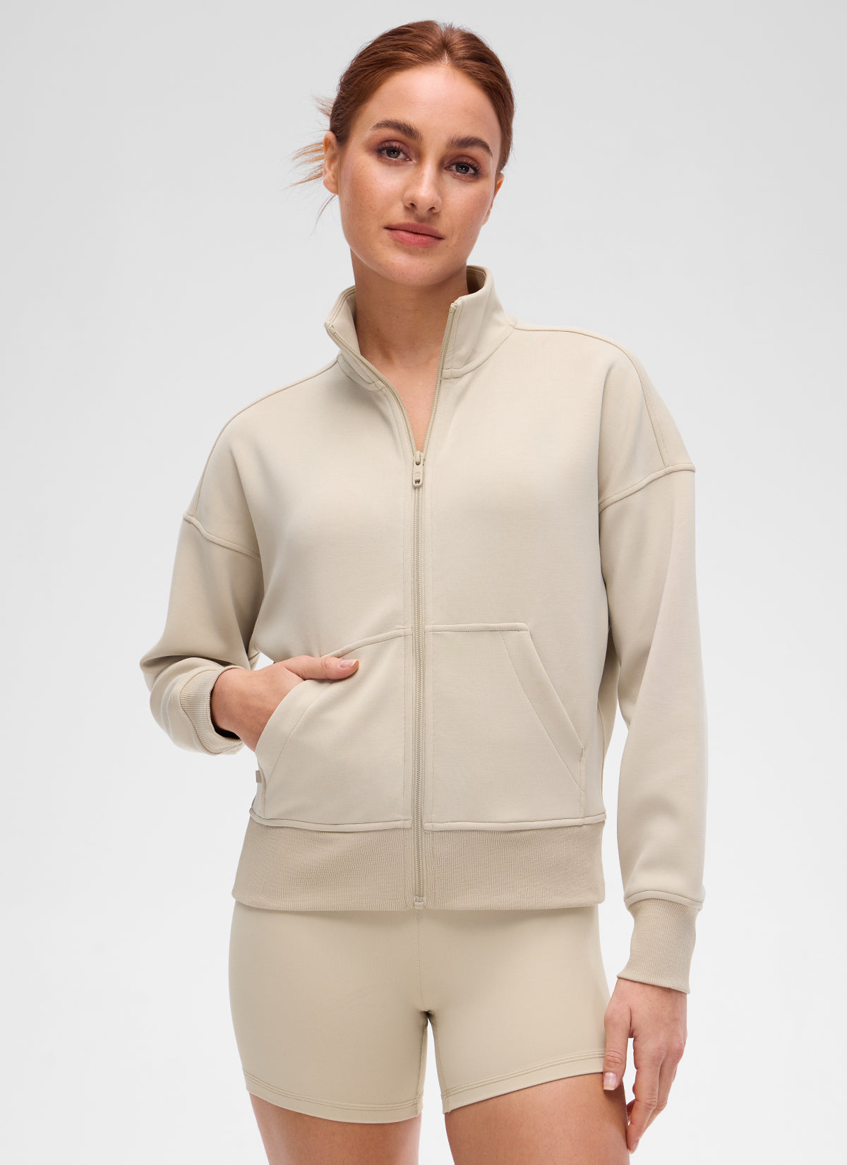 CRZ YOGA Women's Softaura Casual High Mock Neck Pocket Full Zip Jacket Mojave Tan